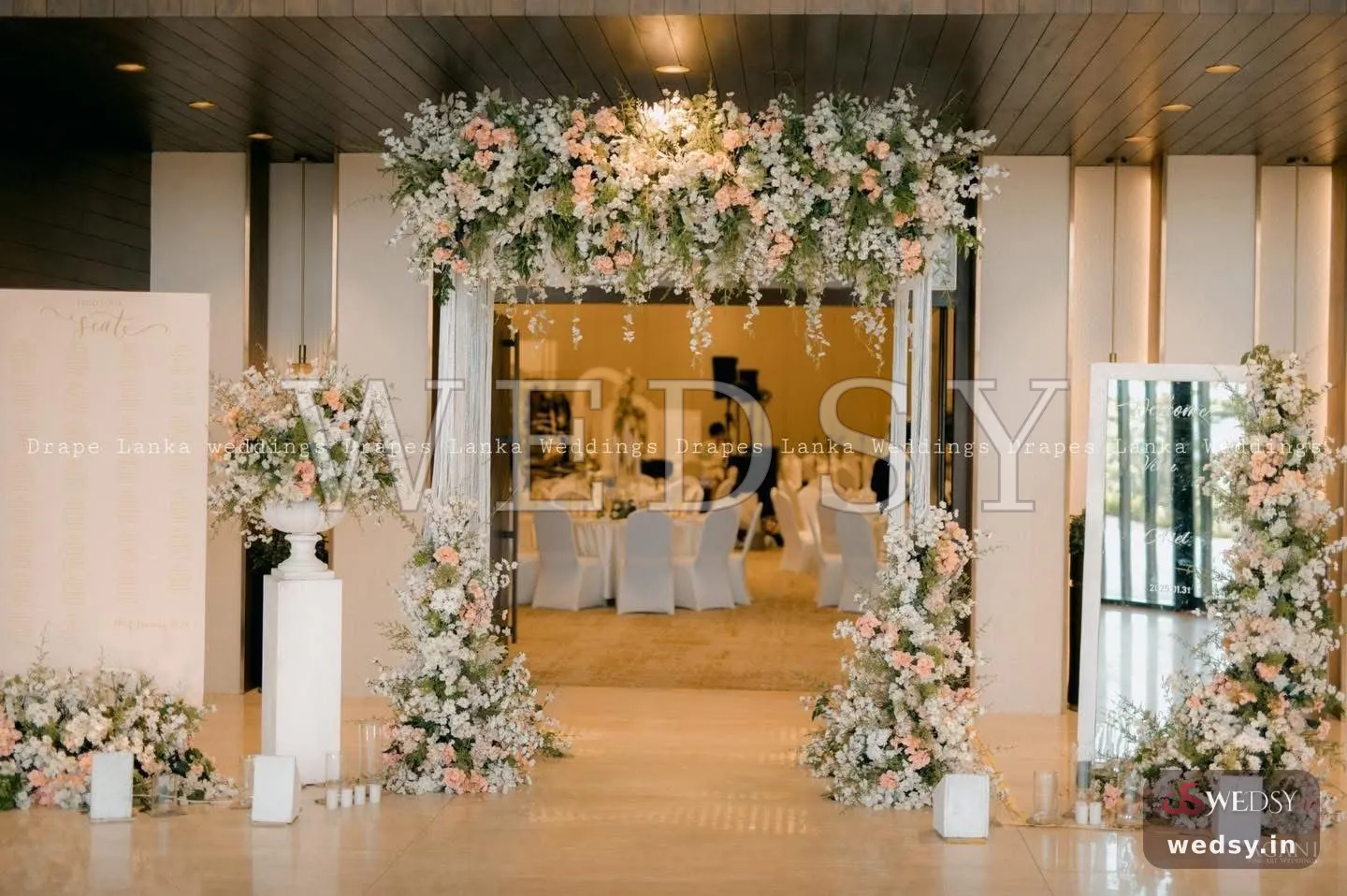 Blossom Gateway — white traditional entrance for reception, Wedsy E081