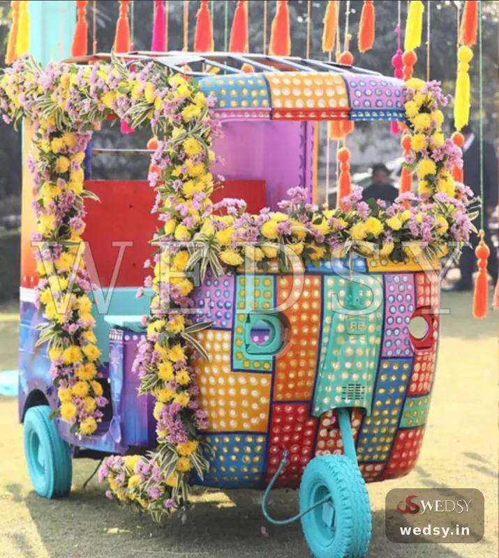 Retro Rickshaw Clicks — pink modern photobooth for haldi & mehendi, Wedsy PH002