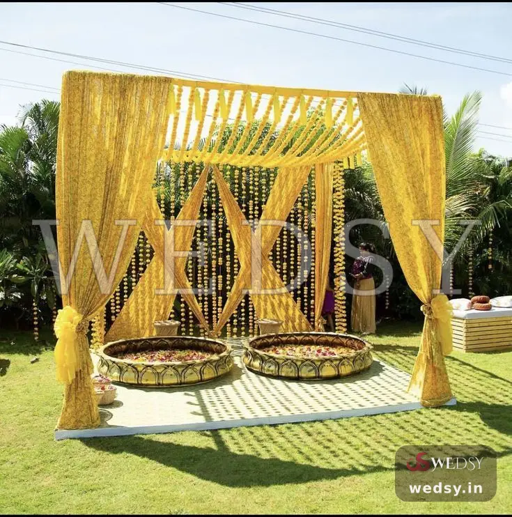 Joyful Fiesta — yellow traditional stage for haldi & mehendi, Wedsy ST101