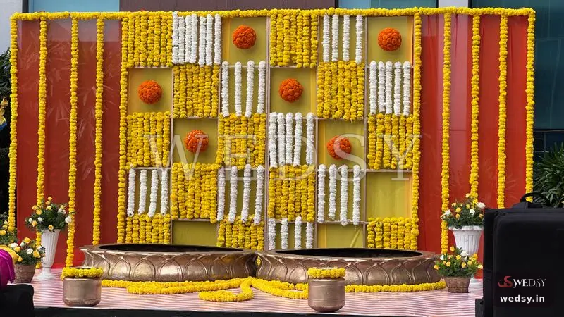 Refined Harmony — yellow traditional stage for haldi & mehendi, Wedsy ST105