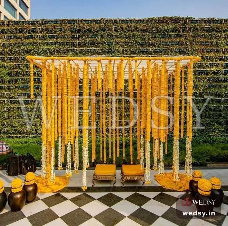 Enigmatic Radiance — orange modern stage for mehendi & haldi, Wedsy ST136